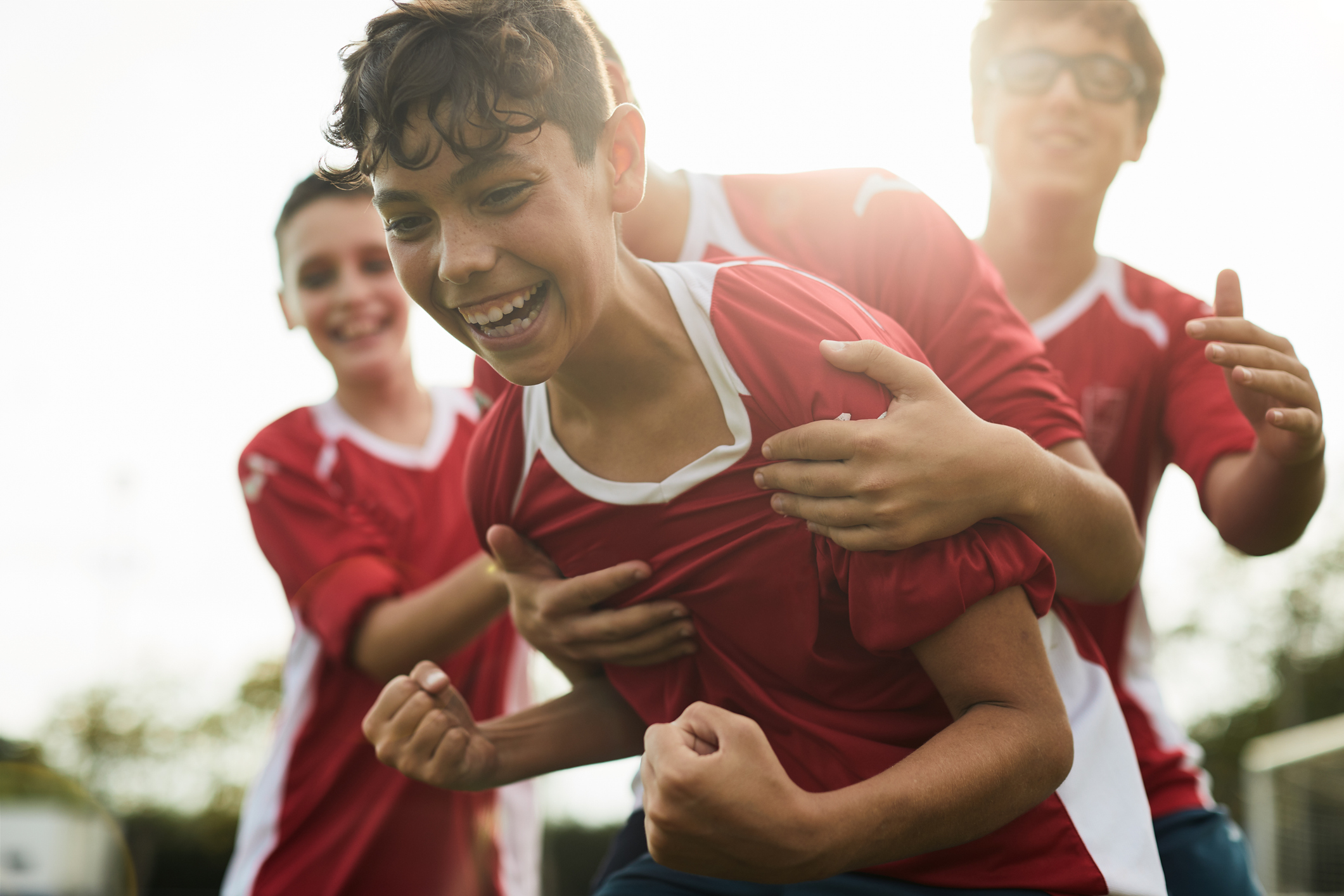 Children training and playing soccer.